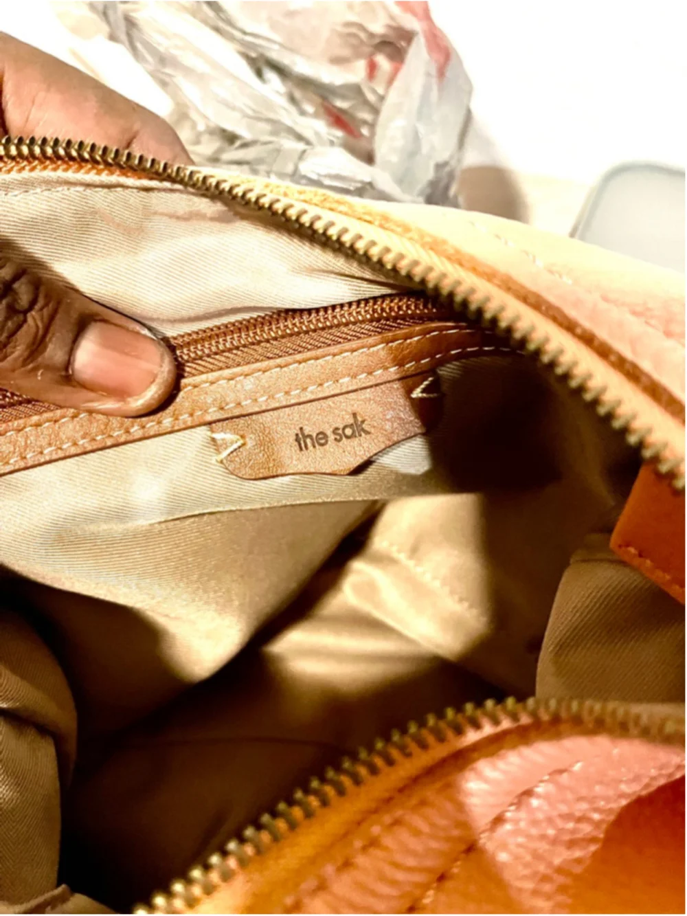 The Sak Jasmine orange leather hobo crossbody bag
